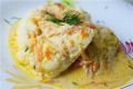 Минтай под ароматным чесночным соусом: простое и вкусное блюдо